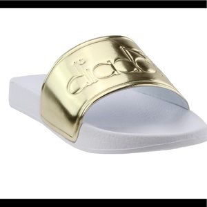 DIADORA WOMEN'S SERIFOS '90S SLIDE SANDALS - GOLD
